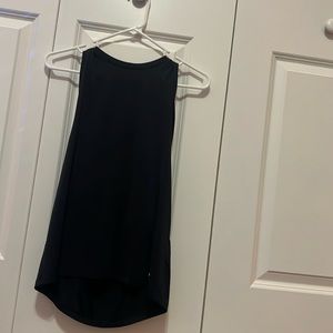 the color is black. the brand is under armour. the size is a youth large